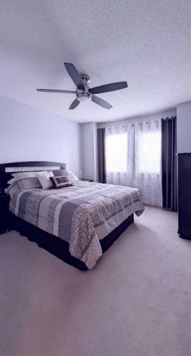 12 Shawbrooke Court Sw, Calgary, AB - Indoor Photo Showing Bedroom