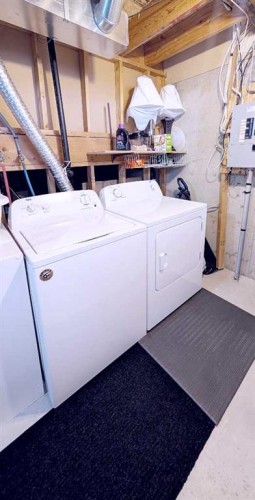 12 Shawbrooke Court Sw, Calgary, AB - Indoor Photo Showing Laundry Room