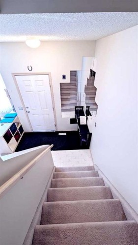 12 Shawbrooke Court Sw, Calgary, AB - Indoor Photo Showing Other Room