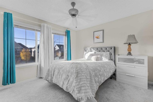 8048 Masters Boulevard Se, Calgary, AB - Indoor Photo Showing Bedroom