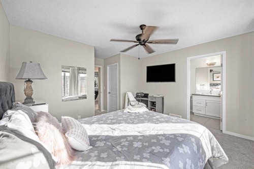 8048 Masters Boulevard Se, Calgary, AB - Indoor Photo Showing Bedroom