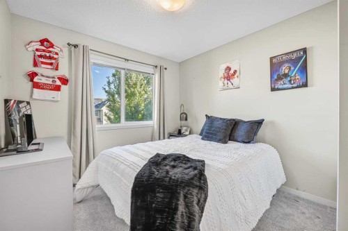 8048 Masters Boulevard Se, Calgary, AB - Indoor Photo Showing Bedroom