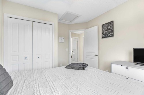 8048 Masters Boulevard Se, Calgary, AB - Indoor Photo Showing Bedroom