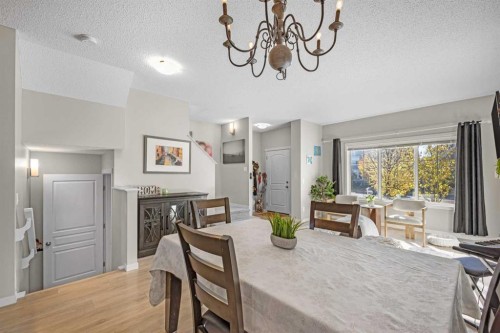 8048 Masters Boulevard Se, Calgary, AB - Indoor Photo Showing Dining Room