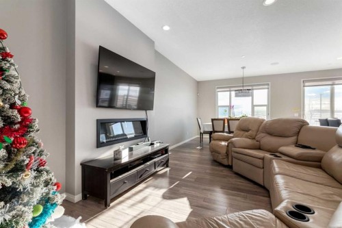 82 Howse Common Ne, Calgary, AB - Indoor Photo Showing Living Room With Fireplace