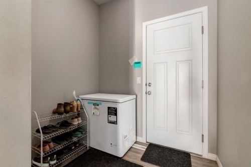 82 Howse Common Ne, Calgary, AB - Indoor Photo Showing Other Room