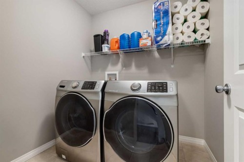 82 Howse Common Ne, Calgary, AB - Indoor Photo Showing Laundry Room