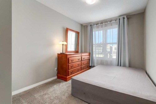 82 Howse Common Ne, Calgary, AB - Indoor Photo Showing Bedroom