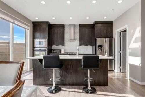 82 Howse Common Ne, Calgary, AB - Indoor Photo Showing Kitchen With Stainless Steel Kitchen With Upgraded Kitchen