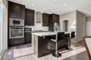 82 Howse Common Ne, Calgary, AB  - Indoor Photo Showing Kitchen With Stainless Steel Kitchen With Upgraded Kitchen 