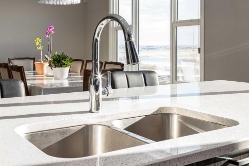 82 Howse Common Ne, Calgary, AB - Indoor Photo Showing Kitchen With Double Sink