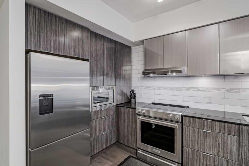 3303-930 6 Avenue Sw, Calgary, AB - Indoor Photo Showing Kitchen With Stainless Steel Kitchen