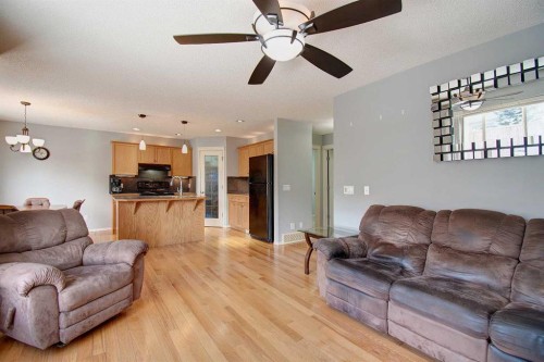 209 Sagewood Place Sw, Airdrie, AB - Indoor Photo Showing Living Room