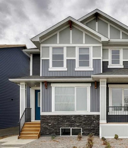 37 Southborough Lane, Cochrane, AB - Outdoor With Facade