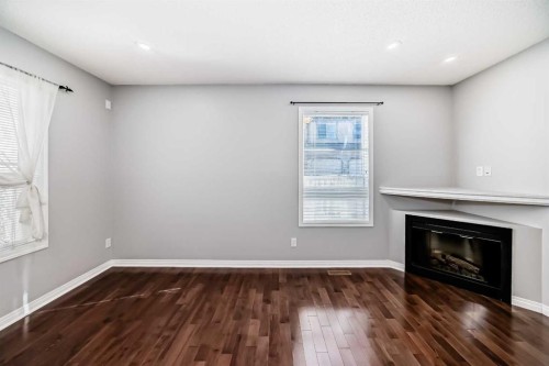 95 Hidden Creek Rise Nw, Calgary, AB - Indoor With Fireplace