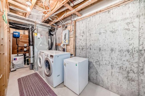 95 Hidden Creek Rise Nw, Calgary, AB - Indoor Photo Showing Laundry Room