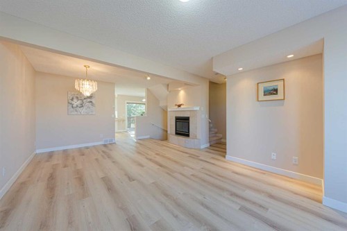 19 Sandarac Road Nw, Calgary, AB - Indoor With Fireplace