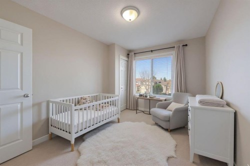 19 Sandarac Road Nw, Calgary, AB - Indoor Photo Showing Bedroom