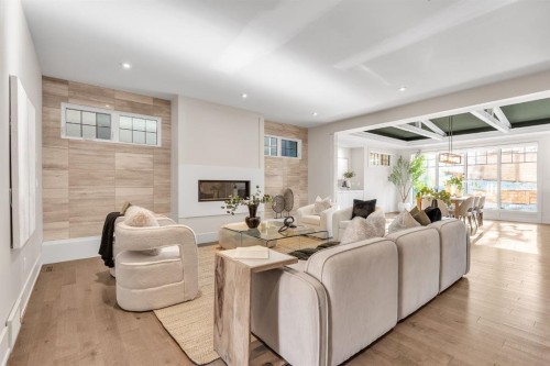 625 Britannia Drive Sw, Calgary, AB - Indoor Photo Showing Other Room With Fireplace