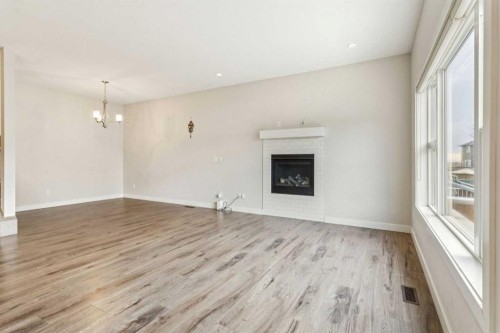 118 Saddlestone Park Ne, Calgary, AB - Indoor With Fireplace