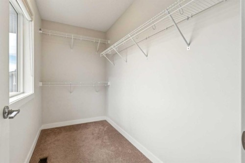 118 Saddlestone Park Ne, Calgary, AB - Indoor With Storage