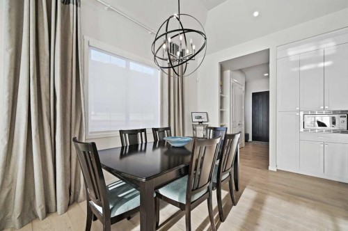 12 Cranbrook Mews Se, Calgary, AB - Indoor Photo Showing Dining Room