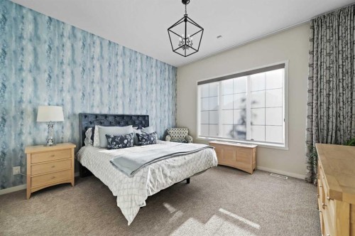 12 Cranbrook Mews Se, Calgary, AB - Indoor Photo Showing Bedroom