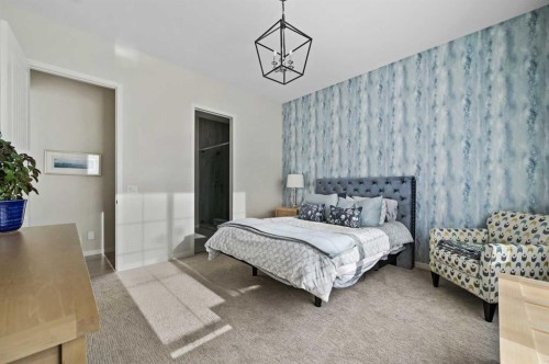 12 Cranbrook Mews Se, Calgary, AB - Indoor Photo Showing Bedroom