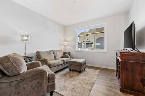 76 Legacy Glen Row Se, Calgary, AB - Indoor Photo Showing Living Room
