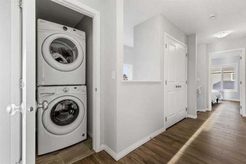 76 Legacy Glen Row Se, Calgary, AB - Indoor Photo Showing Laundry Room