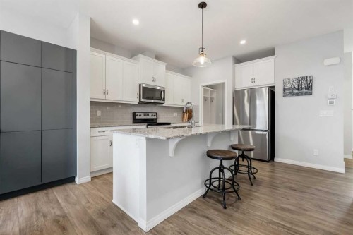 76 Legacy Glen Row Se, Calgary, AB - Indoor Photo Showing Kitchen With Stainless Steel Kitchen With Upgraded Kitchen