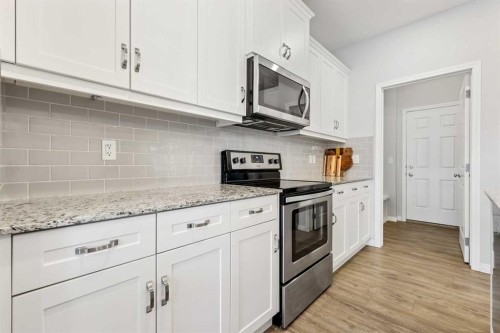 76 Legacy Glen Row Se, Calgary, AB - Indoor Photo Showing Kitchen With Upgraded Kitchen