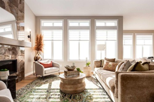 96 Cimarron Estates Drive, Okotoks, AB - Indoor Photo Showing Living Room With Fireplace