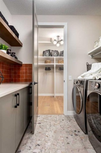 96 Cimarron Estates Drive, Okotoks, AB - Indoor Photo Showing Laundry Room
