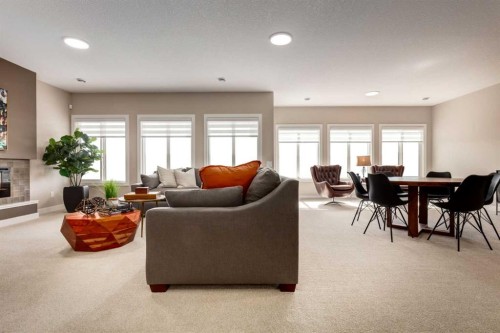 96 Cimarron Estates Drive, Okotoks, AB - Indoor Photo Showing Living Room With Fireplace