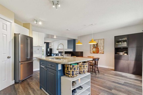 117 Tuscany Drive Nw, Calgary, AB - Indoor Photo Showing Kitchen With Stainless Steel Kitchen With Double Sink