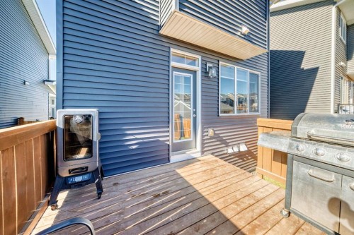 386 Sundown Road, Cochrane, AB - Outdoor With Deck Patio Veranda With Exterior