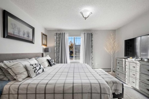 1208 Millrise Point Sw, Calgary, AB - Indoor Photo Showing Bedroom
