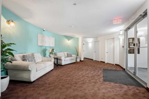 1208 Millrise Point Sw, Calgary, AB - Indoor Photo Showing Living Room