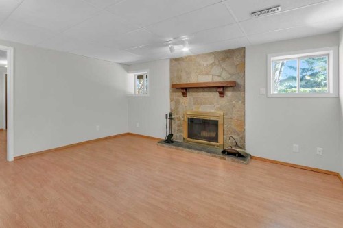 88 Bermondsey Crescent Nw, Calgary, AB - Indoor With Fireplace