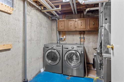 132 Whitehill Place Ne, Calgary, AB - Indoor Photo Showing Laundry Room