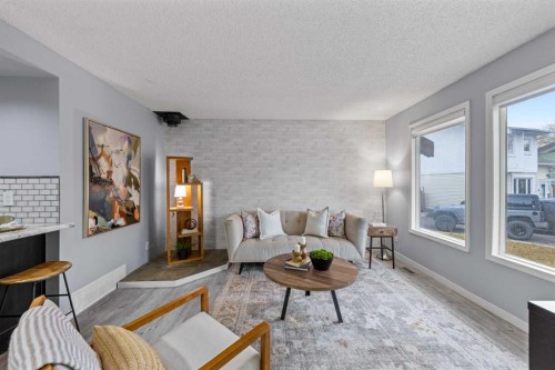 132 Whitehill Place Ne, Calgary, AB - Indoor Photo Showing Living Room