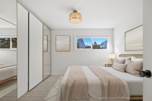327 Canyon Close, Canmore, AB - Indoor Photo Showing Bedroom
