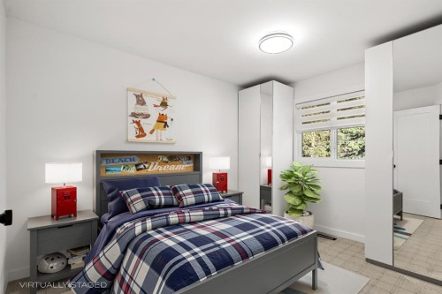 327 Canyon Close, Canmore, AB - Indoor Photo Showing Bedroom