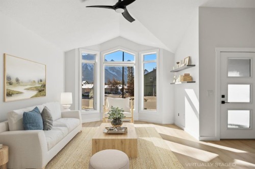 327 Canyon Close, Canmore, AB - Indoor Photo Showing Living Room