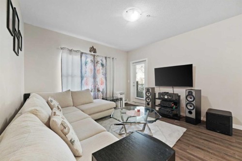 102-200 Cranfield Common Se, Calgary, AB - Indoor Photo Showing Living Room