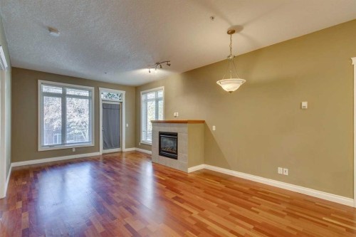 2201-24 Hemlock Crescent Sw, Calgary, AB - Indoor With Fireplace