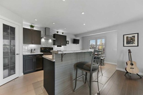 60 Canoe Cove Sw, Airdrie, AB - Indoor Photo Showing Kitchen