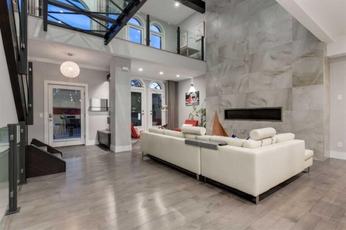 102 18 Avenue Se, Calgary, AB - Indoor Photo Showing Living Room With Fireplace