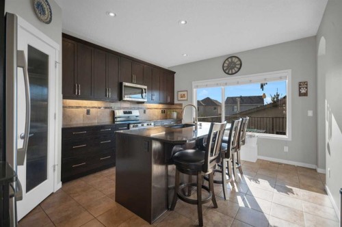 61 Cranford Place Se, Calgary, AB - Indoor Photo Showing Kitchen With Upgraded Kitchen